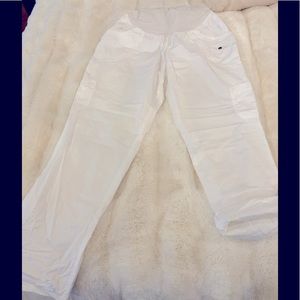 White cotton utility maternity pants. Bottoms roll up with strap. EUC.